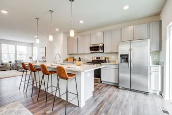 Spacious kitchen with appliances 
